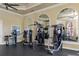 Fully equipped gym with weight machines and mirrors for a complete workout at 2705 Via Murano # 127, Clearwater, FL 33764