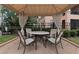 Enclosed patio with seating, offering privacy and a relaxed outdoor setting at 2705 Via Murano # 127, Clearwater, FL 33764