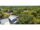 Birds-eye view of a quiet, residential area showcasing homes nestled among mature trees at 2911 N Jefferson St, Tampa, FL 33602