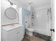 Bright bathroom with modern fixtures, a vanity, and a shower/tub combo at 2911 N Jefferson St, Tampa, FL 33602