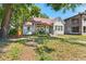 Inviting home showcases a covered front porch, fresh landscaping, and a classic facade at 2911 N Jefferson St, Tampa, FL 33602