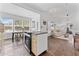 Open kitchen with a dining area, modern appliances, and seamless access to the living space at 2911 N Jefferson St, Tampa, FL 33602