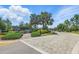 Wesbridge community entrance with landscaping and signage at 30273 Marquette Ave, Wesley Chapel, FL 33545