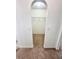 Walk-in closet with ample storage space, wire shelving, and neutral carpet at 3181 Deltona Blvd, Spring Hill, FL 34606
