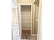 Spacious closet with ample shelving and a neutral-colored interior, perfect for storage at 3181 Deltona Blvd, Spring Hill, FL 34606