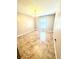 Open dining area with neutral paint, tile floors, and a window for natural light at 3181 Deltona Blvd, Spring Hill, FL 34606