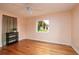 Bedroom featuring hardwood floors, a ceiling fan and a window with natural light at 3321 14Th N St, St Petersburg, FL 33704