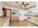 Bright kitchen featuring granite countertops, white appliances and tile flooring at 3321 14Th N St, St Petersburg, FL 33704