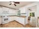Bright kitchen featuring granite countertops, white appliances and tile flooring at 3321 14Th N St, St Petersburg, FL 33704