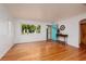 Bright living room with hardwood floors and a decorative console table at 3321 14Th N St, St Petersburg, FL 33704