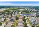This aerial shot showcases a neighborhood with ponds, green spaces, and a variety of home styles at 3351 Lintower Dr, Land O Lakes, FL 34638