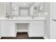 Bright bathroom with double sink vanity and white cabinets providing generous storage space at 3602 W Iowa Ave, Tampa, FL 33611