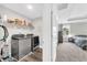 Spacious laundry room featuring modern washer and dryer with easy access to the main bedroom at 3602 W Iowa Ave, Tampa, FL 33611