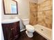 Bathroom featuring a stand-up shower, decorative vanity, and dark wood-style flooring at 3615 W Cherry St, Tampa, FL 33607