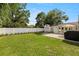 The large backyard is fenced and features a patio, fire pit, and a shed at 4208 W Bay Vista Ave, Tampa, FL 33611