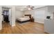 Bright bedroom features wood floors, ceiling fan, closet and abundant natural light at 4208 W Bay Vista Ave, Tampa, FL 33611