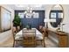 Elegant dining room featuring stylish lighting and decorative accents at 4286 Cairoli Ct, Wesley Chapel, FL 33543