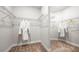 Spacious walk-in closet features ample shelving, offering plenty of storage space at 4286 Cairoli Ct, Wesley Chapel, FL 33543