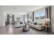 Bright and spacious living room featuring a neutral color palette and an abundance of natural light at 4381 Sand Dollar Way, Zephyrhills, FL 33541