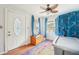 Inviting entryway with a colorful rug, a decorative door, and natural lighting at 4801 71St N St, St Petersburg, FL 33709