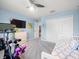 Bright bedroom with a Peloton bike, and ample storage at 4805 Holdsworth Dr, Land O Lakes, FL 34639