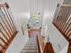 Grand foyer with staircase and front door entrance at 4805 Holdsworth Dr, Land O Lakes, FL 34639