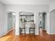 Interior view featuring breakfast bar with seating and kitchen in the background at 4805 Holdsworth Dr, Land O Lakes, FL 34639
