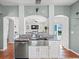 Stylish kitchen with stainless steel appliances, granite countertops, and a breakfast bar at 4805 Holdsworth Dr, Land O Lakes, FL 34639