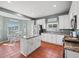Lovely kitchen with stainless appliances, a center island, and beautiful countertops at 4805 Holdsworth Dr, Land O Lakes, FL 34639
