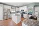 Beautiful kitchen with stainless steel appliances, an island, and granite countertops at 4805 Holdsworth Dr, Land O Lakes, FL 34639