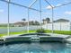 Inviting pool with a built-in spa and lush landscaping at 4805 Holdsworth Dr, Land O Lakes, FL 34639