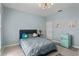 Comfortable bedroom featuring a cozy bed, modern lighting, and stylish decorations at 501 Knights Run Ave # 5103, Tampa, FL 33602