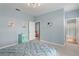Bright bedroom with a view into an en suite bathroom, featuring comfortable furniture and decor at 501 Knights Run Ave # 5103, Tampa, FL 33602