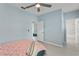 Comfortable bedroom offering a view to the bathroom and hallway at 501 Knights Run Ave # 5103, Tampa, FL 33602