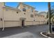 Harbour Place townhome exteriors with garages, showcasing classic architecture and private entrances at 501 Knights Run Ave # 5103, Tampa, FL 33602