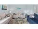 Well-lit living room features comfortable seating and thoughtful decor at 501 Knights Run Ave # 5103, Tampa, FL 33602
