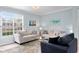 Comfortable living room showcasing stylish furnishings, neutral color palette, and an open, airy ambiance at 501 Knights Run Ave # 5103, Tampa, FL 33602