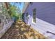 Exterior view of a home with a yard, trees, and foliage at 5010 109Th N Way, St Petersburg, FL 33708