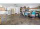 Spacious garage with shelving and laundry area at 5010 109Th N Way, St Petersburg, FL 33708
