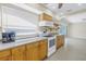 A bright kitchen with stainless steel appliances and countertops, perfect for cooking and entertaining at 5010 109Th N Way, St Petersburg, FL 33708