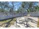 Exterior backyard showing concrete patio, mature trees and foliage at 5010 109Th N Way, St Petersburg, FL 33708