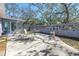 Backyard with concrete patio area, mature trees and foliage, great for enjoying outdoor living at 5010 109Th N Way, St Petersburg, FL 33708