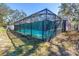 Back exterior view showing screened pool enclosure at 5010 109Th N Way, St Petersburg, FL 33708