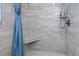 Updated shower with built-in bench and white subway tile at 5010 109Th N Way, St Petersburg, FL 33708