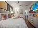 Comfortable bedroom with a ceiling fan, stylish decor, and great natural lighting creates a relaxing retreat at 5332 Riverwalk Preserve Dr, New Port Richey, FL 34653