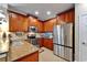 Well-appointed kitchen with stainless steel appliances and ample cabinet space at 5646 Sunset Falls Dr, Apollo Beach, FL 33572