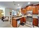 Spacious kitchen with stainless steel appliances and granite countertops at 5646 Sunset Falls Dr, Apollo Beach, FL 33572