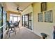 Relaxing lanai with a ceiling fan and outdoor seating area, perfect for entertaining at 5646 Sunset Falls Dr, Apollo Beach, FL 33572