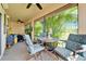 Spacious lanai offering comfortable seating and peaceful views of the surrounding landscape at 5646 Sunset Falls Dr, Apollo Beach, FL 33572