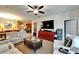 Open-concept living space featuring a living room, dining area, and kitchen layout at 5646 Sunset Falls Dr, Apollo Beach, FL 33572